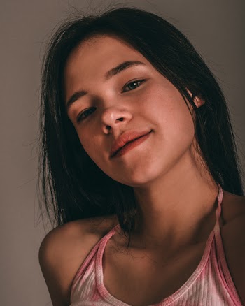 Photo of Woman Wearing Pink Top