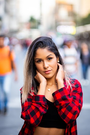 Photo of Woman Wearing Plaid Shirt