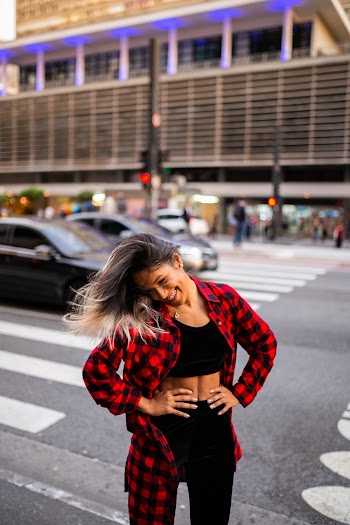 Photo of Woman Wearing Plaid Shirt