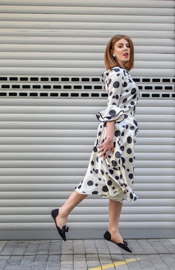 Photo of Woman Wearing Polka Dot Dress
