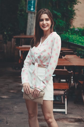 Photo Of Woman Wearing Polka Dots Top