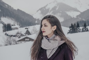 Photo Of Woman Wearing Purple Coat