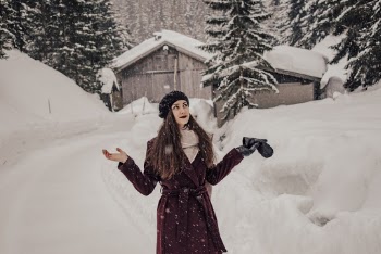 Photo Of Woman Wearing Purple Coat