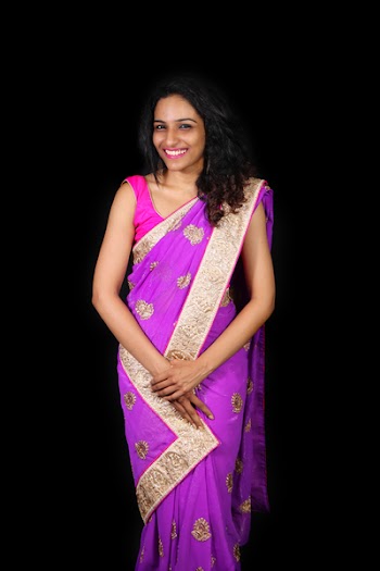 Photo of Woman Wearing Purple Sari Dress