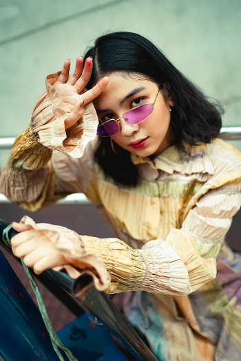 Photo Of Woman Wearing Purple Sunglasses