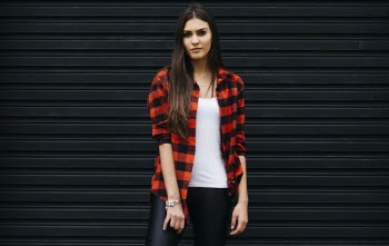 Photo of Woman Wearing Red and Black Checkered Shirt