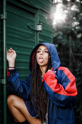 Photo of Woman Wearing Red And Blue Jacket