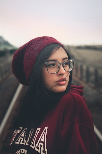 Photo of Woman Wearing Red Bonnet