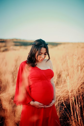 Photo of Woman Wearing Red Dress