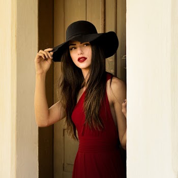 Photo of Woman Wearing Red Dress