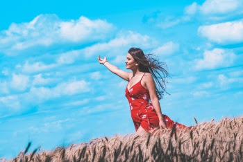 Photo of Woman Wearing Red Dress