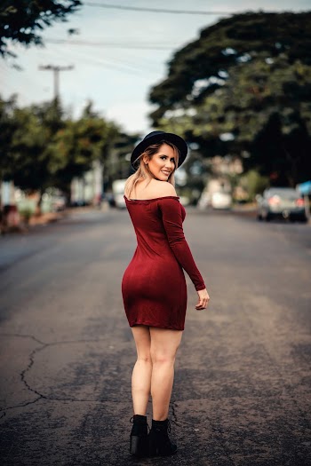 Photo of Woman Wearing Red Dress