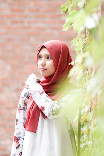 Photo of Woman Wearing Red Hijab