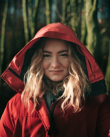 Photo Of Woman Wearing Red Jacket