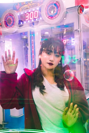Photo of Woman Wearing Red Jacket