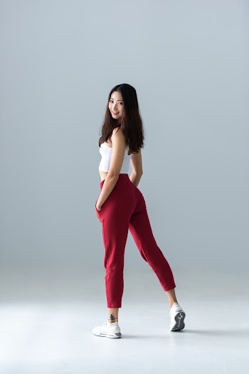 Photo of Woman Wearing Red Pants