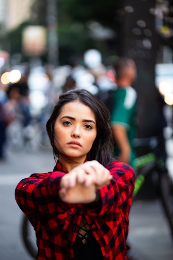 Photo of Woman Wearing Red Plaid Shirt