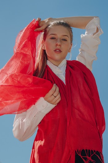 Photo Of Woman Wearing Red Scarf