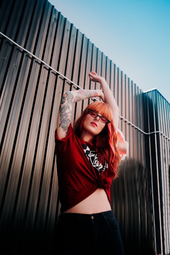 Photo Of Woman Wearing Red Shirt
