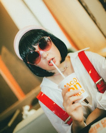 Photo Of Woman Wearing Red Sunglasses