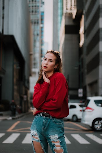 Photo Of Woman Wearing Red Sweater