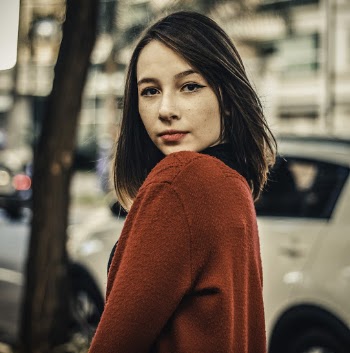 Photo Of Woman Wearing Red Sweater
