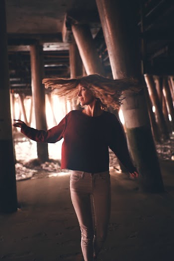 Photo Of Woman Wearing Red Sweaters 