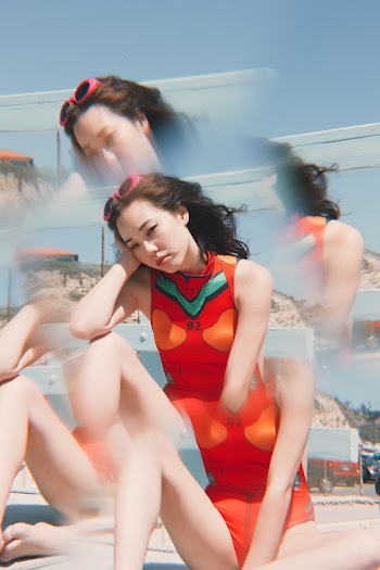 Photo Of Woman Wearing Red Swimsuit