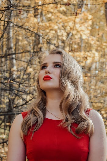 Photo Of Woman Wearing Red Tank Top