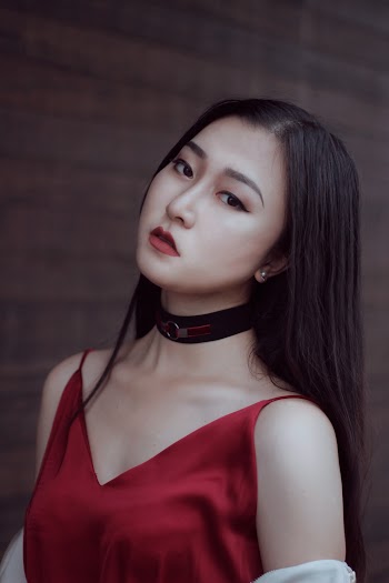 Photo Of Woman Wearing Red Tank Top