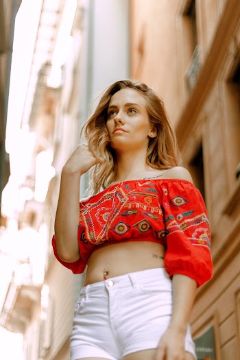Photo Of Woman Wearing Red Top