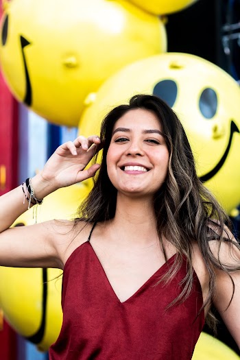 Photo of Woman Wearing Red Top