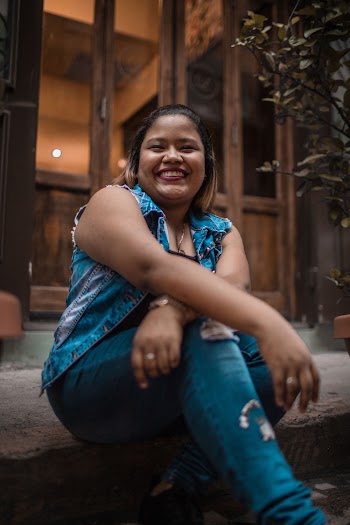 Photo Of Woman Wearing Ripped Jeans