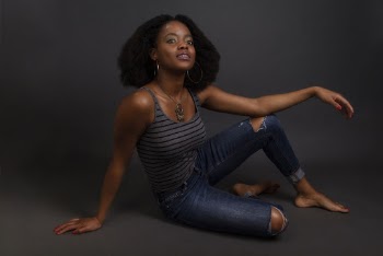 Photo of Woman Wearing Ripped Jeans