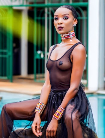 Photo of Woman Wearing See Through Dress