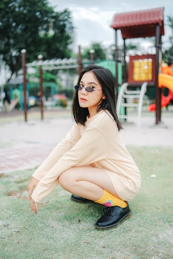 Photo of Woman Wearing Shades