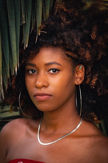 Photo Of Woman Wearing Silver Necklace