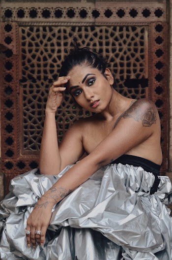 Photo Of Woman Wearing Silver Ruffles