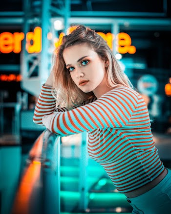 Photo of Woman Wearing Striped Crop Top