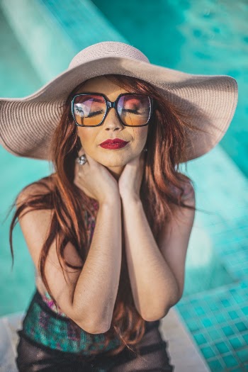 Photo of Woman Wearing Summer Hat
