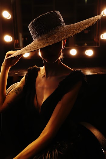 Photo Of Woman Wearing Sun Hat