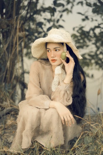Photo of Woman Wearing Sun Hat