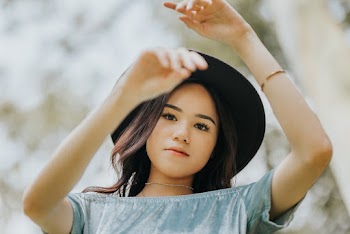 Photo Of Woman Wearing Sun Hat