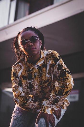 Photo of Woman Wearing Sunglasses