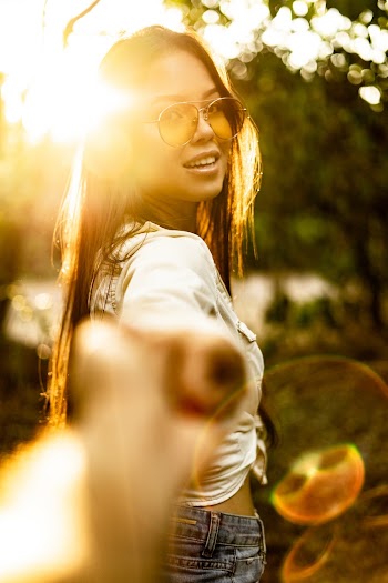 Photo of Woman Wearing Sunglasses