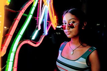 Photo of Woman Wearing Sunglasses