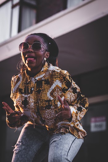 Photo of Woman Wearing Sunglasses