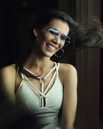 Photo of Woman Wearing Sunglasses