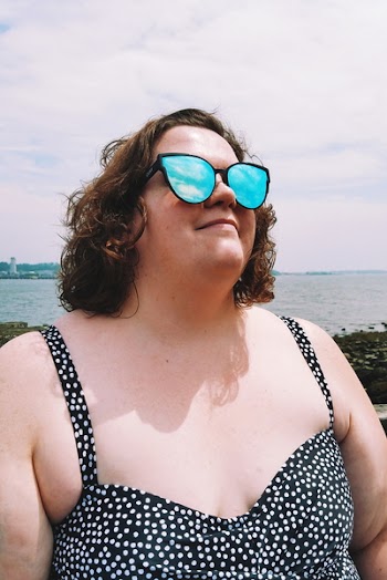 Photo of Woman Wearing Sunglasses