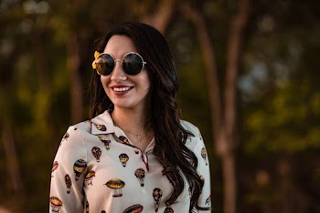Photo of Woman Wearing Sunglasses